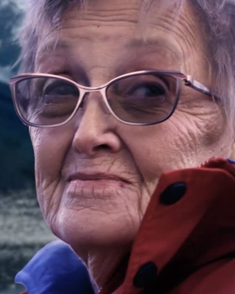 Joyce Perrin in a red expedition jacket