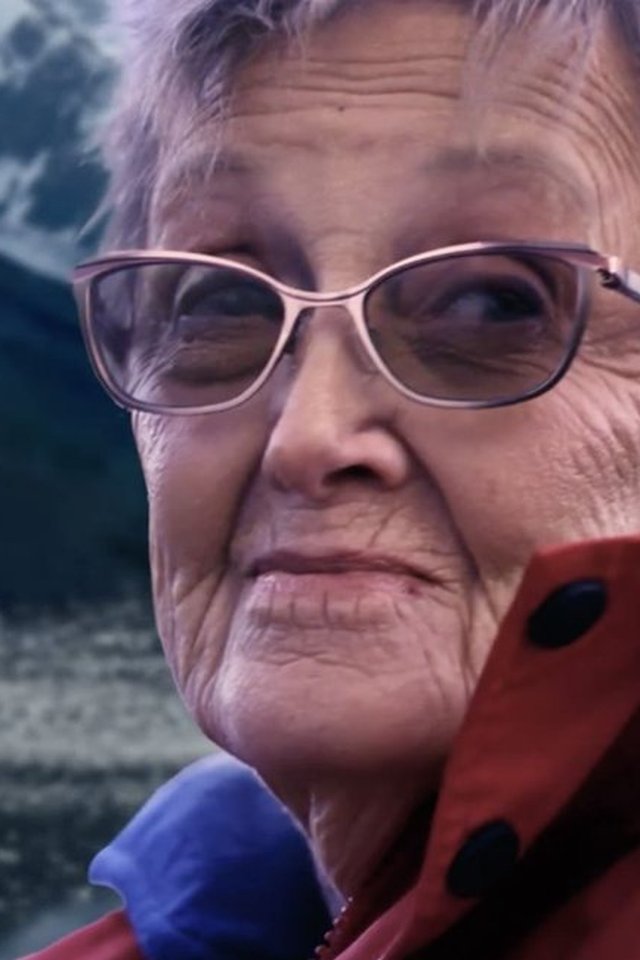 Northbound at 90: Joyce Perrin in a red expedition jacket