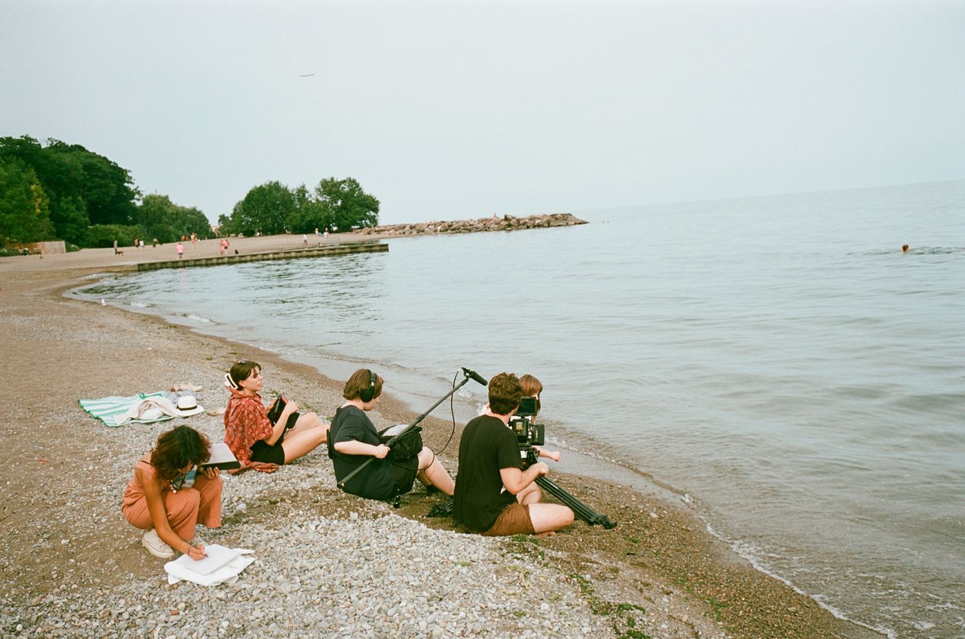 Crew filming on the beach
