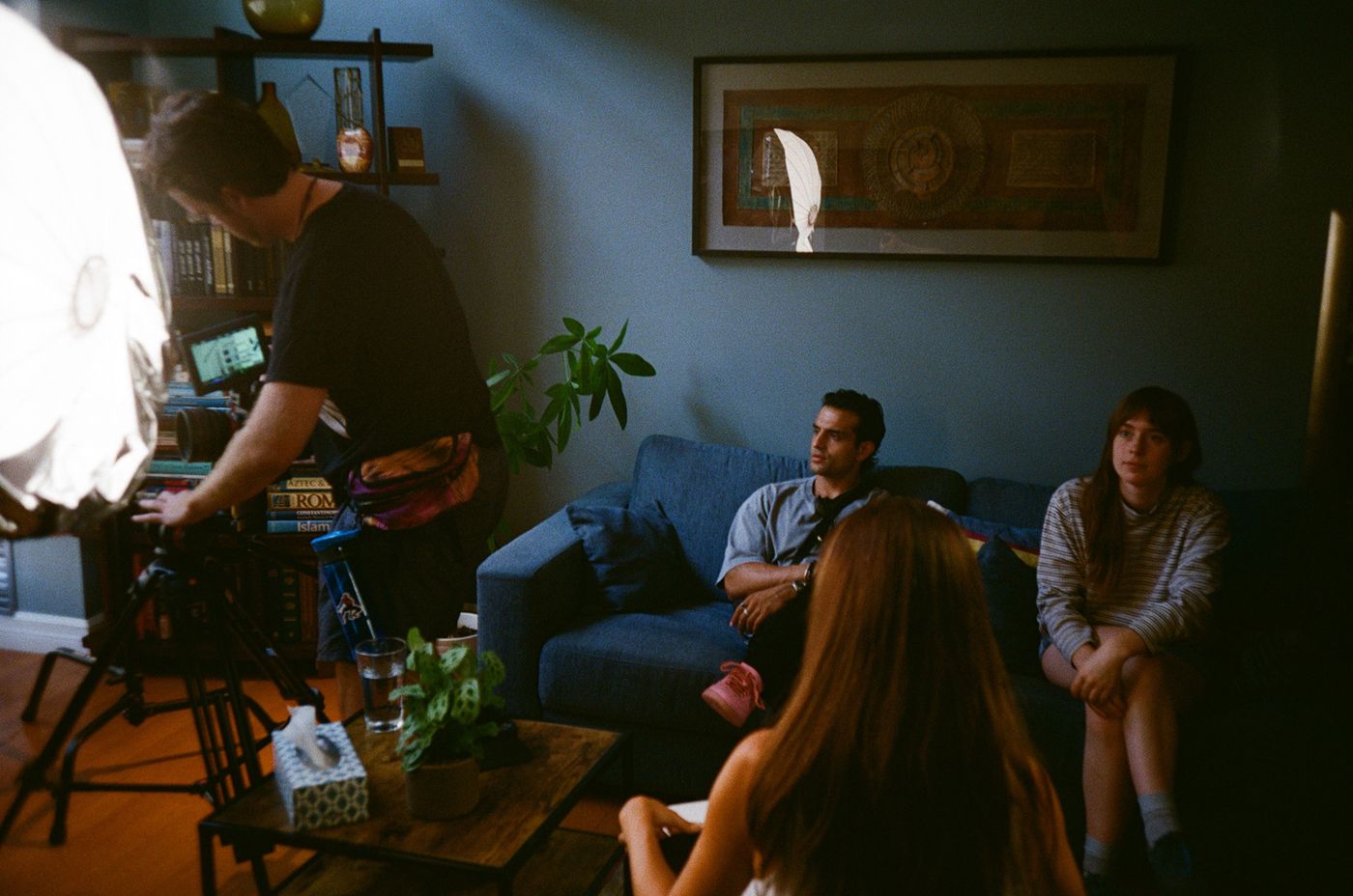 Crew lighting a living-room scene